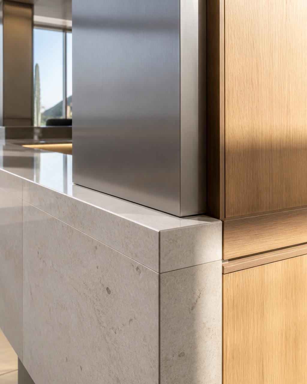 Limestone, brushed steel, and oak material detailing